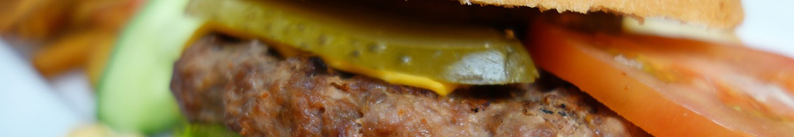 Eating American (Traditional) Burger at Texas Hamburger Palace restaurant in Houston, TX.